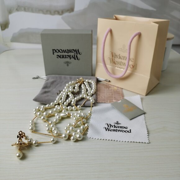 Vivienne Westwood Jewelry - Vivienne Westwood Irregular Three Row Pearl Bas Relief Choker in gold